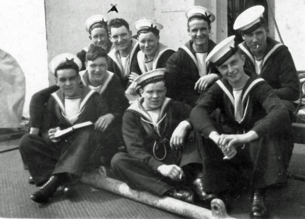 Clifford back row (2nd from the left) onboard HMS Resolution